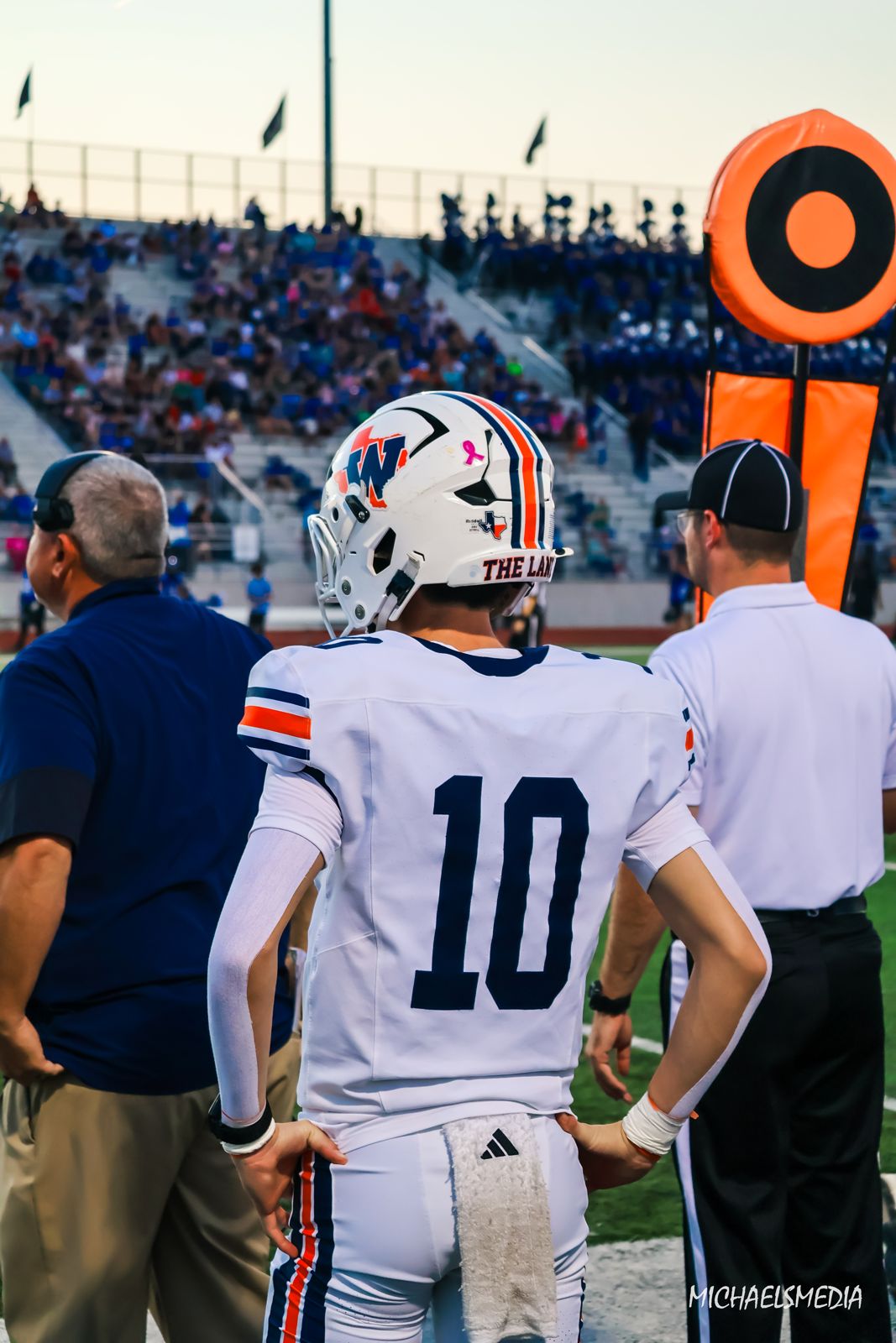 Wakeland #10 watching from the sideline