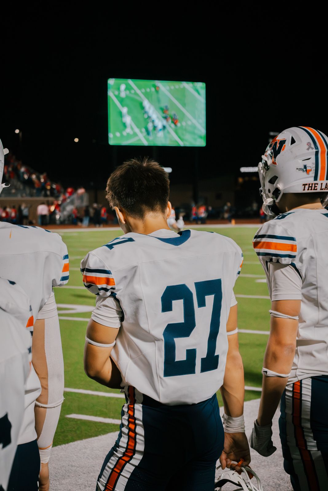 Wakeland #27 walking onto the field